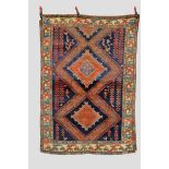 Kurdish rug, north west Persia, about 1930-40s, 6ft. 6in. x 4ft. 7in. 1.98m. x 1.40m. Losses to