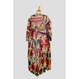 Uzbek silk ikat woman’s robe with narrow braid to waistband with braid ties, trimmed with metal