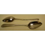 A pair of late eighteenth century Irish silver taper end table spoons, crested. Maker J. Brady,