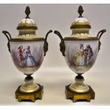 A pair of nineteenth century French porcelain mantlepiece urns, with ormolu mounts, the bodies