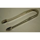 Exeter, a pair of George III West Country bright cut sugar tongs, engraved initials. Maker Richard
