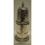 A William III silver lighthouse caster, engraved a contemporary coat of arms above a girdle