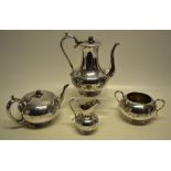 A Victorian electroplated four piece tea and coffee service, the bodies with engraved foliage and