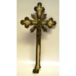An Austrian painted and gilded carved wooden Catholic crucifix. 19.75in (50cm). Possibly late