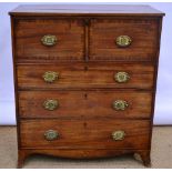 A Regency faded mahogany secretaire, the top cross banded inlaid stringing to the border and to