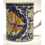 An eighteenth century Chinese porcelain blue and white pint mug, decorated famille rose enamel in