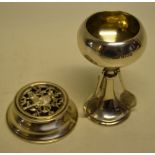 A small silver tennis trophy, the bowl with gilding inside, the stem foot supported by three