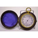 An Edwardian gilt brass cased pocket thermometer with a circular silvered dial, 2in diameter, in the