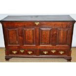 An eighteenth century oak Lancashire mule chest, the hinged lidded compartment with mahogany banding