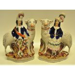 A pair of Victorian Staffordshire groups, of a highlander wearing a kilt and his Lassie, standing by