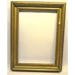 An early nineteenth century/late eighteenth century giltwood and gesso carved rectangular picture