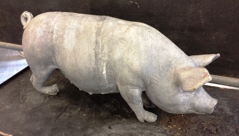 A lead casting of a model pig. 25.25in (64cm).