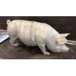 A lead casting of a model pig. 25.25in (64cm).