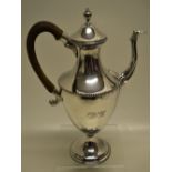 Hester Bateman, A George III vase shape coffee pot with beaded borders and engraved a double