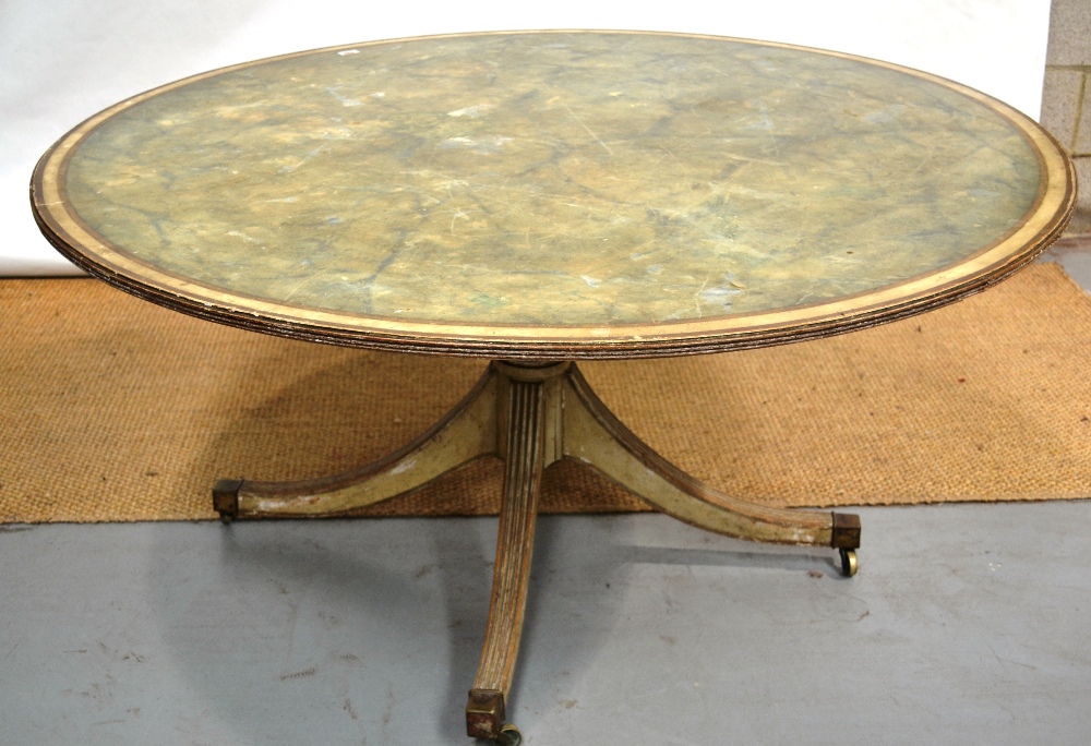 A painted beech centre table, the circular top with simulated marbling with a cream banded border to