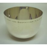 A large silver tumbler cup, the rim inscribed for a Christening. 3.8in (9.6cm) diameter. Makers