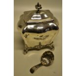 A late Victorian silver tea caddy, in an eighteenth century style, serpentine panelled, with a