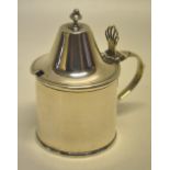 A George III silver cylindrical mustard pot, the cone shape hinged cover with an acorn finial, a