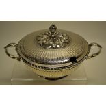 An Edwardian silver sauce tureen, in late seventeenth century style, the fluted circular body with