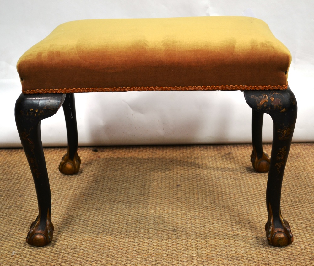 A rectangular stool, the stuffed over seat covered in a gold velvet dralon, the cabriole legs