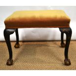 A rectangular stool, the stuffed over seat covered in a gold velvet dralon, the cabriole legs