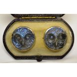 A Victorian Labradorite pair of cloak studs, the circular carved owl faces in plain yellow gold