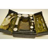 A lady's Edwardian green leather vanity case by Edward and James, Regent Street, with silver