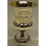 A George IV silver cup, the campanula shape part panelled body with engraved presentation for hare