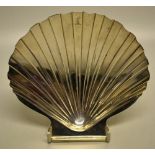 A George III silver escallop butter shell, crested, on two cast welk feet. Maker William Abdy,