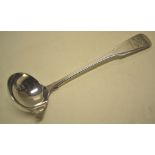 A Regency Irish silver fiddle pattern cream ladle, engraved a crest of a swan pierced with an arrow,