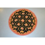 Savonnerie circular rug, France, about 1930s 3ft. 10in. dia.; 1.17m. dia. Together with a Kashmir