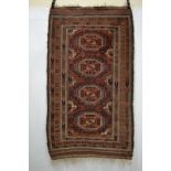 Baluchi rug, Khorasan, north east Persia, early 20th century, 6ft. 4in. x 3ft. 7in. 1.93m. x 1.