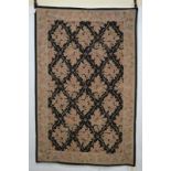 Needlework rug, European, early 20th century, 7ft. 6in. x 4ft. 10in. 2.29m. x 1.47m. Overall wear