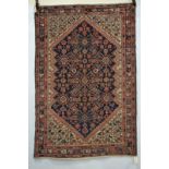 Malayer rug, north west Persia, about 1930s, 6ft. 1in. x 4ft. 1in. 1.86m. x 1.25m. Overall wear;