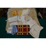 Collection of table linen including yellow linen cloth with matching crochet border, 34in., 94cm.