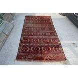 Yomut Turkmen banded long carpet, Turkmenistan, early 20th century, 9ft. x 4ft. 9in. 2.75m. x 1.45m.