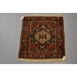 Saruk mat, north west Persia, circa 1930s, 2ft. 8in. x 2ft. 5in. 0.81m. x 0.74m. Slight wear in