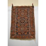 Karaja rug, north west Persia, about 1920s, 4ft. 4in. x 3ft. 1in. 1.32m. x 0.94m. Slight loss to top