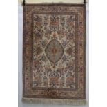Tabriz ivory field rug, north west Persia, mid-20th century, 6ft. x 3ft. 11in. 1.83m. x 1.20m.