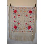 Chinese ivory silk shawl, embroidered in coloured silks with large bright pink paeonies surrounded
