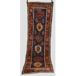Fragmented north west Persian runner, possibly Shahsavan, early 20th century, 12ft. 3in. x 3ft. 9in.