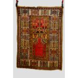 Ladik prayer rug, central Anatolia, circa 1930s 4ft. 6in. x 3ft. 5in. 1.37m. x 1.04m. Overall wear