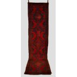 Ushak ‘red and blue’ runner, west Anatolia, circa 1920s-30s, 12ft. 5in. x 3ft. 2in. 3.78m. x 0.