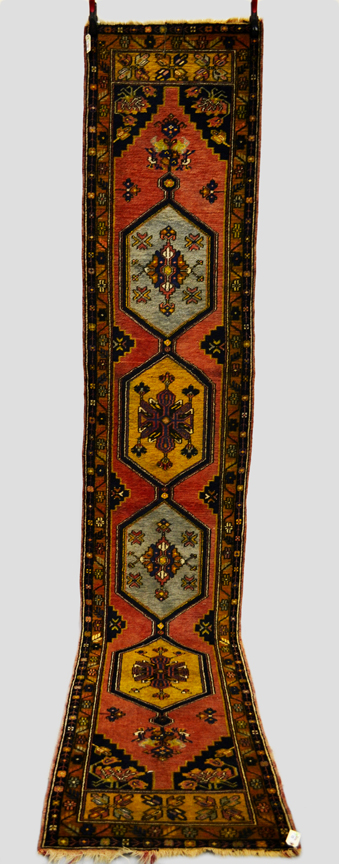 Anatolian runner, probably west Anatolia, circa 1930s 12ft. 10in. x 2ft. 6in. 3.90m. x 0.76m. Slight