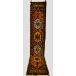 Anatolian runner, probably west Anatolia, circa 1930s 12ft. 10in. x 2ft. 6in. 3.90m. x 0.76m. Slight
