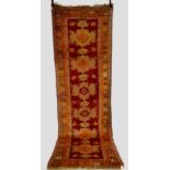 Good Ushak runner, west Anatolia, about 1930s, 11ft. 11in. x 3ft. 10in. 3.63m. x 1.17m. Small