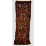 Hamadan runner, north west Persia, circa 1930s, 10ft. x 3ft. 5in. 3.05m. x 1.04m. Some wear and