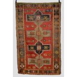 Karabakh dated rug with four medallions on a red field, south west Caucasus, early 20th century,