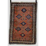 Erivan rug of Perepedil design on a soft red field, central Caucasus, early 20th century, 4ft.