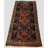 Good Luri main carpet, Luristan, south west Persia, early 20th century, 12ft. 8in. x 5ft. 7in. 3.
